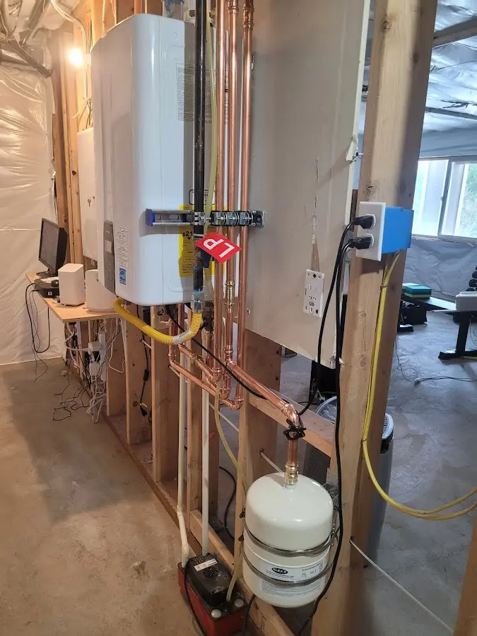 Licensed plumber repairing a kitchen sink in Palmyra